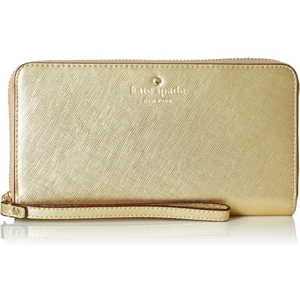 Like new KATE SPADE METALLIC GOLD WRISTLET
